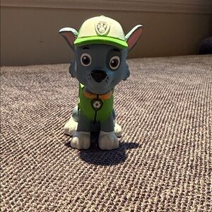 Green and Gray Paw Patrol Rocky Tonies character Toy